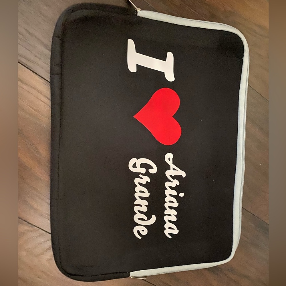 An I heart Ariana grande laptop case / bag .